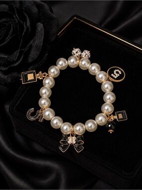 Pearl Perfume Bottle Charm Bracelet with Black & Gold Accents